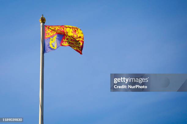 The Royal Standard of the United Kingdom flag is seen at Buckingham Palace in London, United Kingdom on 11 December, 2019.