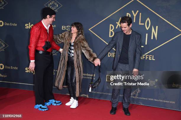 Lars Eidinger, Tom Tykwer and his wife Marie Steinmann attend the 3rd season "Babylon Berlin" TV series world premiere at Zoo Palast on December 16,...