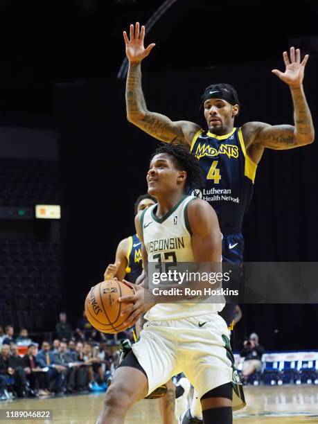 Walt Lemon Jr. #4 of the Fort Wayne Mad Ants handles the ball against Jemerrio Jones of the Wisconsin Herd on December 16, 2019 at Memorial Coliseum...