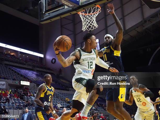 JaKarr Sampson of the Fort Wayne Mad Ants handles the ball against Rayjon Tucker of the Wisconsin Herd on December 16, 2019 at Memorial Coliseum in...