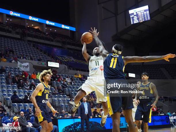 JaKarr Sampson the Fort Wayne Mad Ants shoots the ball against Shannon Bouges of the Wisconsin Herd on December 16, 2019 at Memorial Coliseum in Fort...