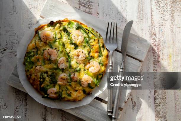 homemade healthy breakfast: vegetable shrimp frittata - omelette stock pictures, royalty-free photos & images