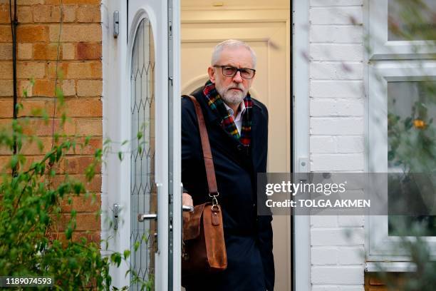 Britain's opposition Labour Party leader Jeremy Corbyn leaves his home in north London on December 17, 2019 for the first full day of the new...