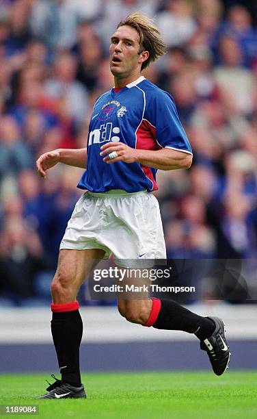 Fernando Ricksen of Glasgow Rangers in action during the John Brown Testimonial match against Anderlecht played at Ibrox in Glasgow, Scotland. \...