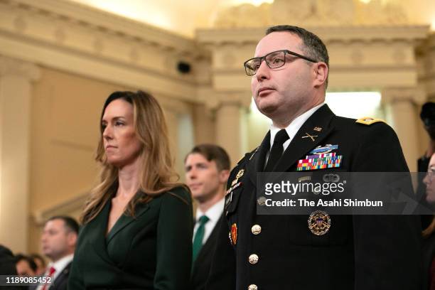 Jennifer Williams, aide to Vice President Mike Pence and Lt. Col. Alexander Vindman, National Security Council Director for European Affairs, attend...