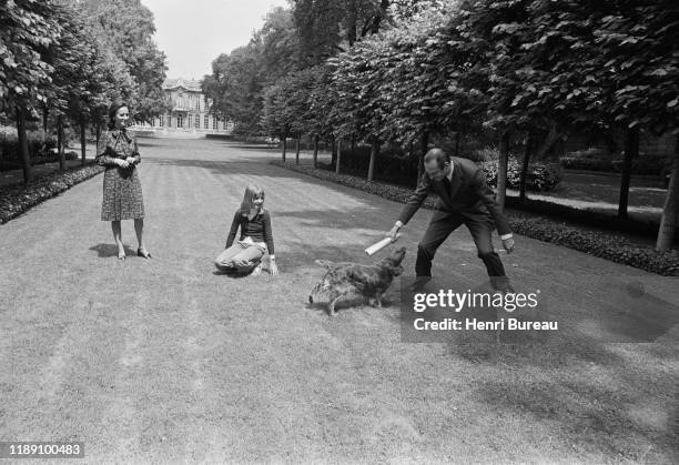 Jacques and Bernadette Chirac with their daughter Claude in the gardens of Matignon Palace. Jacques Chirac became Prime Minister in May 1974.