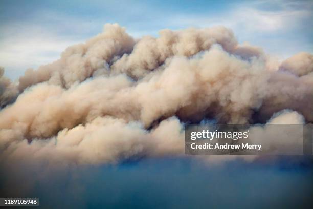 close up of large smoke cloud in sky from forest fire, bushfire, air pollution, australia - australia fire stock pictures, royalty-free photos & images