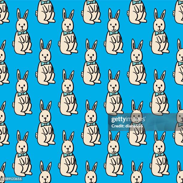 rabbit doodled seamless pattern - multiplying rabbits stock illustrations