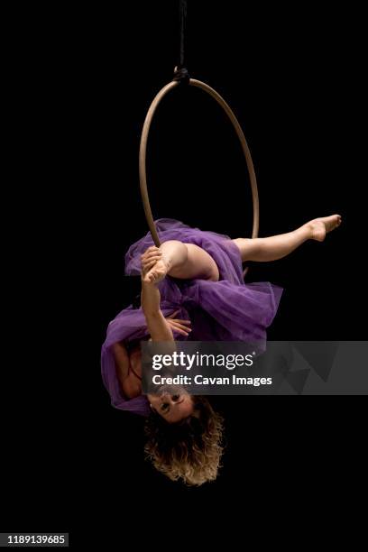 aerial dancing beauty - circus performer stock pictures, royalty-free photos & images