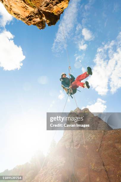 Caption: Push yourself to new heights and conquer the most challenging rock faces.
