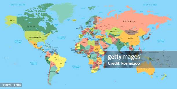 multicolored world map with capitals and countries - world map stock illustrations