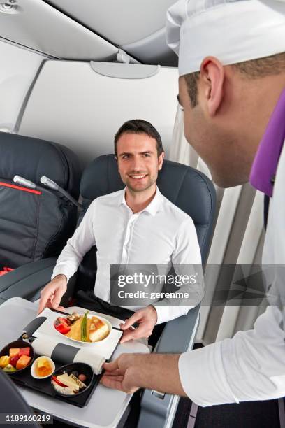having airplane food - plane food stock pictures, royalty-free photos & images