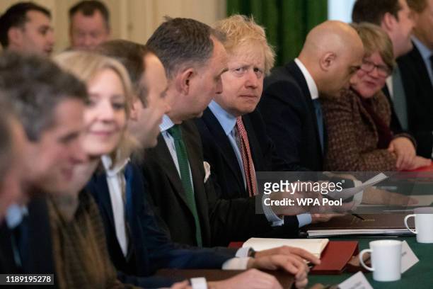 British Prime Minister Boris Johnson prepares to speak during his first cabinet meeting since the general election, inside 10 Downing Street on...