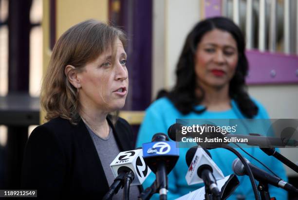 YouTube CEO Susan Wojcicki speaks as San Francisco mayor London Breed looks on during a press conference at Hamilton Families on November 21, 2019 in...