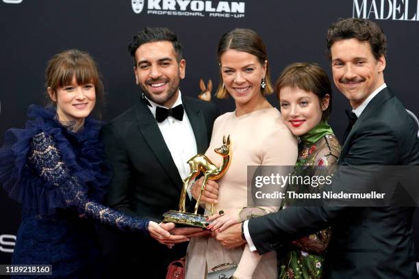 Lena Schoemann, Elyas M'Barek, Jessica Schwarz, Jella Haase and Florian David Fitz pose with award during the 71th Bambi Awards winners board at...