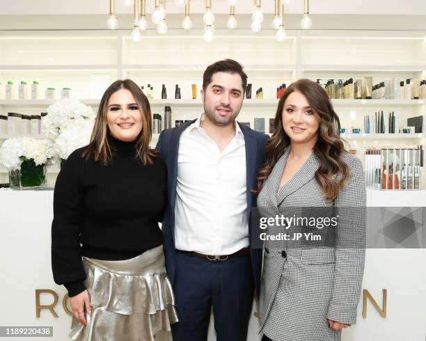 Liana Davydova, Roman K Salon owners Rachel Shimanova and Roman Kusayev attend the Roman K Salon Madison Avenue Opening on November 21, 2019 in New...