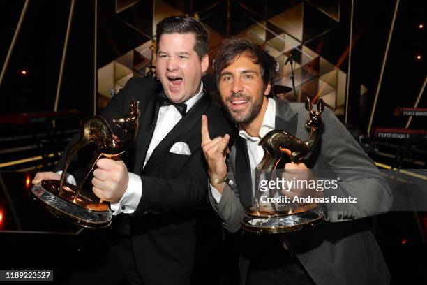 Chris Tall and Max Giesinger pose with their awards during the 71st Bambi Awards show at Festspielhaus Baden-Baden on November 21, 2019 in...