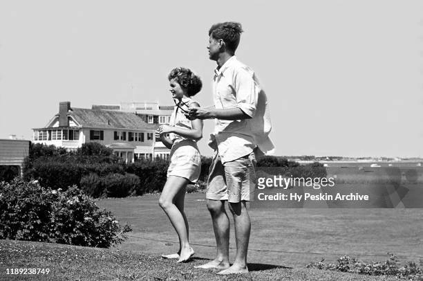 Senator John F. Kennedy and fiance Jacqueline Bouvier on vacation at the Kennedy compound in June, 1953 in Hyannis Port, Massachusetts.