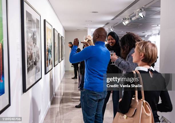 General view of atmosphere during Masterplan25: The Oasis Photographs private view on November 21, 2019 in London, England.