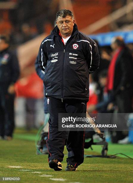 Chile's head coach Claudio Borghi gestures, during their 2011 Copa America Group C first round football match against Peru, at the Malvinas...