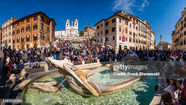 Panoramic view of the Spanish Steps, Scalinata di Trinità dei Monti and the Fountain of the Boat, Fontana della Barcaccia, visited by hundreds of...