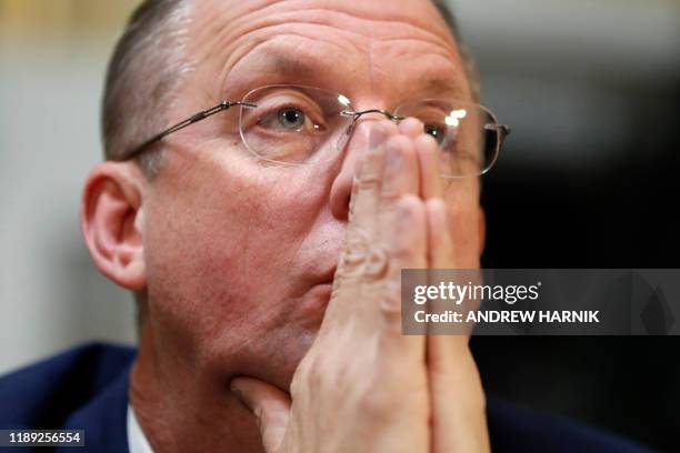 House Judiciary Committee ranking member Rep. Doug Collins, R-GA listens during a meeting of a House Rules Committee hearing on the impeachment...