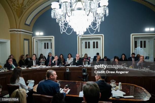 At bottom, from L, House Judiciary Committee ranking member Rep. Doug Collins and Rep. Jamie Raskin attend a House Rules Committee hearing concerning...