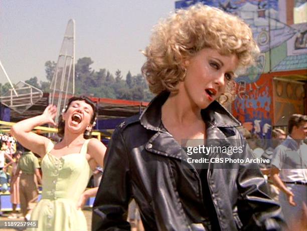 The movie "Grease", directed by Randal Kleiser. Seen here from left, Jamie Donnelly as Jan and Olivia Newton-John as Sandy. Initial theatrical...
