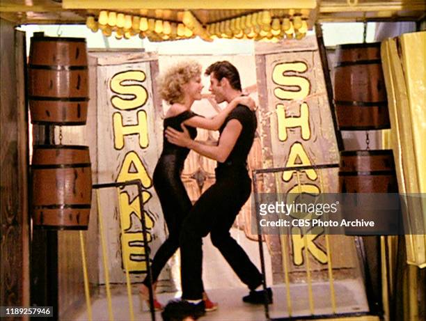 The movie "Grease", directed by Randal Kleiser. Seen here from left, Olivia Newton-John as Sandy and John Travolta as Danny Zuko singing 'You're the...