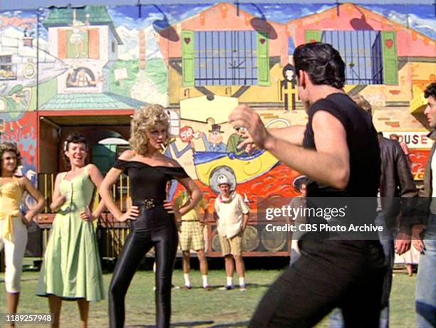 The movie "Grease", directed by Randal Kleiser. Seen here from left, Olivia Newton-John as Sandy and John Travolta as Danny Zuko singing 'You're the...