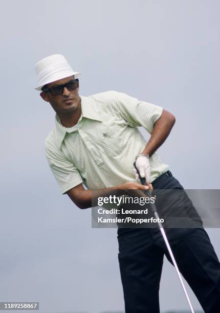 Puerto Rican golfer Chi Chi Rodriguez in action, circa 1970.