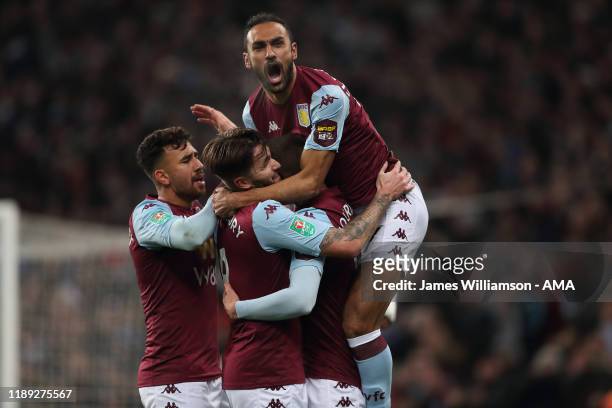 Conor Hourihane of Aston Villa celebrates after scoring a goal to make it 1-0 with teammates during the Carabao Cup Quarter Final match between Aston...