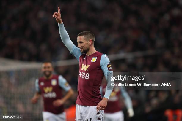 Conor Hourihane of Aston Villa celebrates after scoring a goal to make it 1-0 during the Carabao Cup Quarter Final match between Aston Villa and...