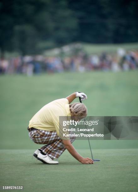 American golfer Forrest Fezler marks his putt during the US Open Golf Championship at the Winged Foot Golf Club in Mamaroneck, New York on 16th June...