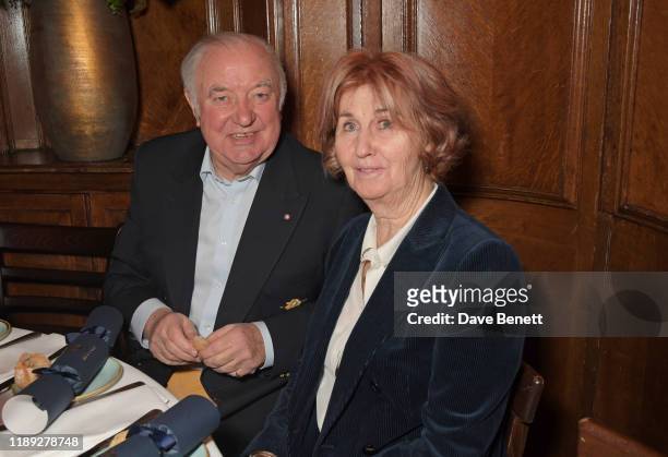 Jimmy Tarbuck and Pauline Tarbuck attend Tramp's Christmas Party in celebration of their 50th Anniversary on December 17, 2019 in London, England.