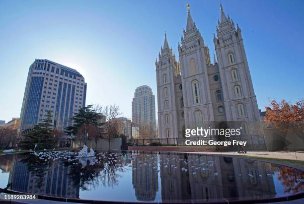The City Creek Center, sits across the street from the Church of Jesus Christ of Latter-Day Saints historic Mormon Salt Lake Temple on December 17,...