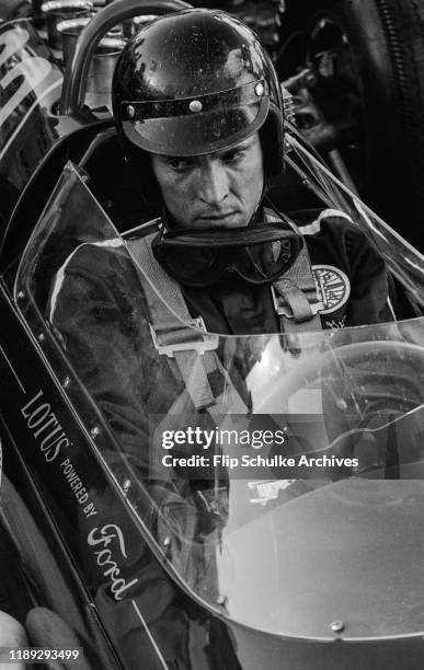 American racer Dan Gurney in his Ford-powered, English-built Lotus racer during the Indy time trials at Indianapolis Motor Speedway, 1963.