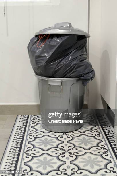 trash can filled with garbage - dustbin stock pictures, royalty-free photos & images