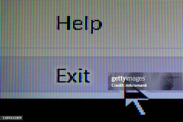 cursor pointing to word exit on a computer screen - computer cursor stock pictures, royalty-free photos & images