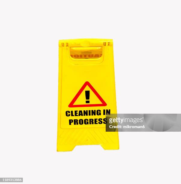 caution slippery surface sign on wet floor - accessibility awareness stock pictures, royalty-free photos & images