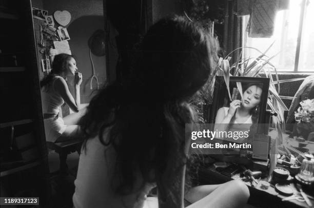 Model Marie Helvin, preparing to be photographed by her husband, David Bailey, August 18th, 1977.