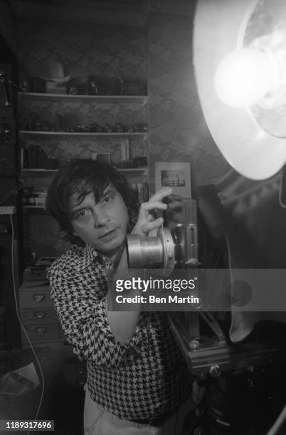 David Bailey preparing photographs with wife Marie Helvin, August 18th, 1977.