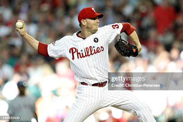 National League All-Star Roy Halladay of the Philadelphia Phillies throws a pitch in the first inning of the 82nd MLB All-Star Game at Chase Field on...