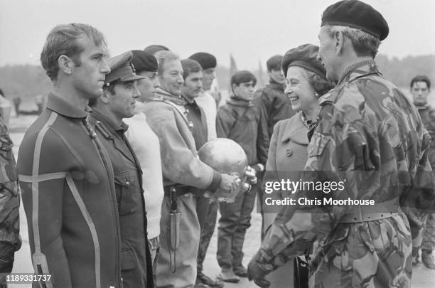 Elizabeth II, Queen of the United Kingdom, meets soldiers in Hawley, military base used by British Army for basic sailing training, UK, 26th October...