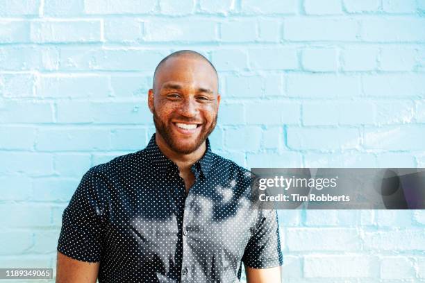 portrait of smiling man - true peoples celebration day one stock pictures, royalty-free photos & images