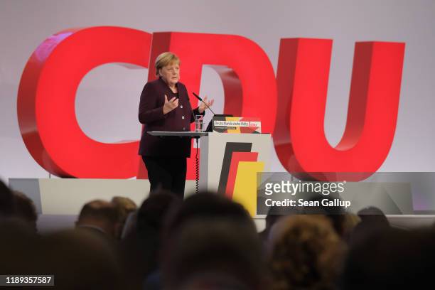 German Chancellor and former leader of the German Christian Democrats Angela Merkel speaks at the 32nd federal congress of the German Christian...