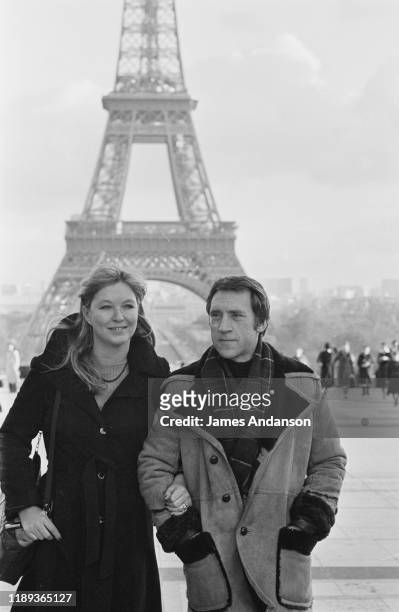 French actress Marina Vlady in front of the Eiffel Tower at the Trocadero, Paris, with her husband Vladimir Vysotsky, a Russian anti-establishment...