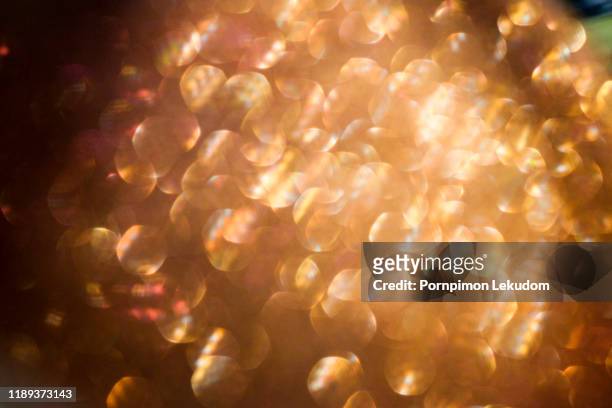 illuminated glitter background - glam rock stock pictures, royalty-free photos & images