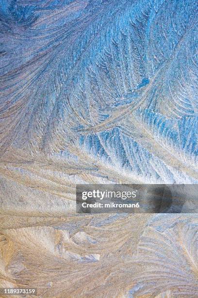 close-up of frost pattern on car - rime ice stock-fotos und bilder