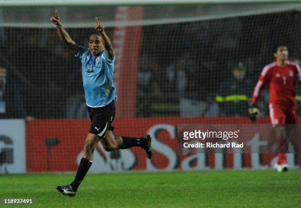 July 12: Uruguay's Alvaro Pereira celebrate after scoring against Mexico during 2011 Copa America soccer match as part of the Group C at the Ciudad...